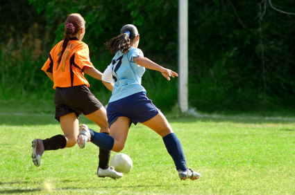 teen-girls-playing-soccer